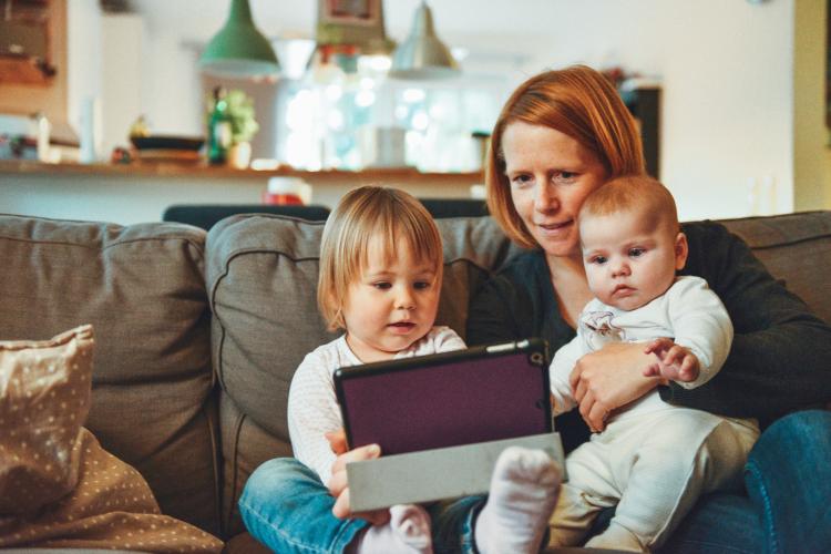 family using a tablet at home